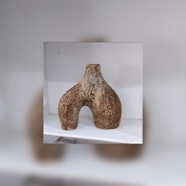 Rustic sculptural terracotta vessel